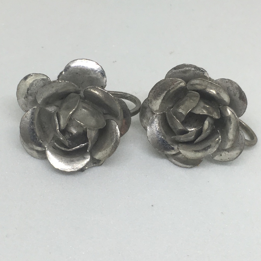 Sterling silver marked rose twist back earrings